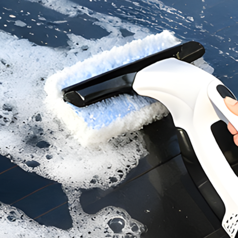Beelines Window Vacuum step 3 - scrape foam and stains with 28cm squeegee blade