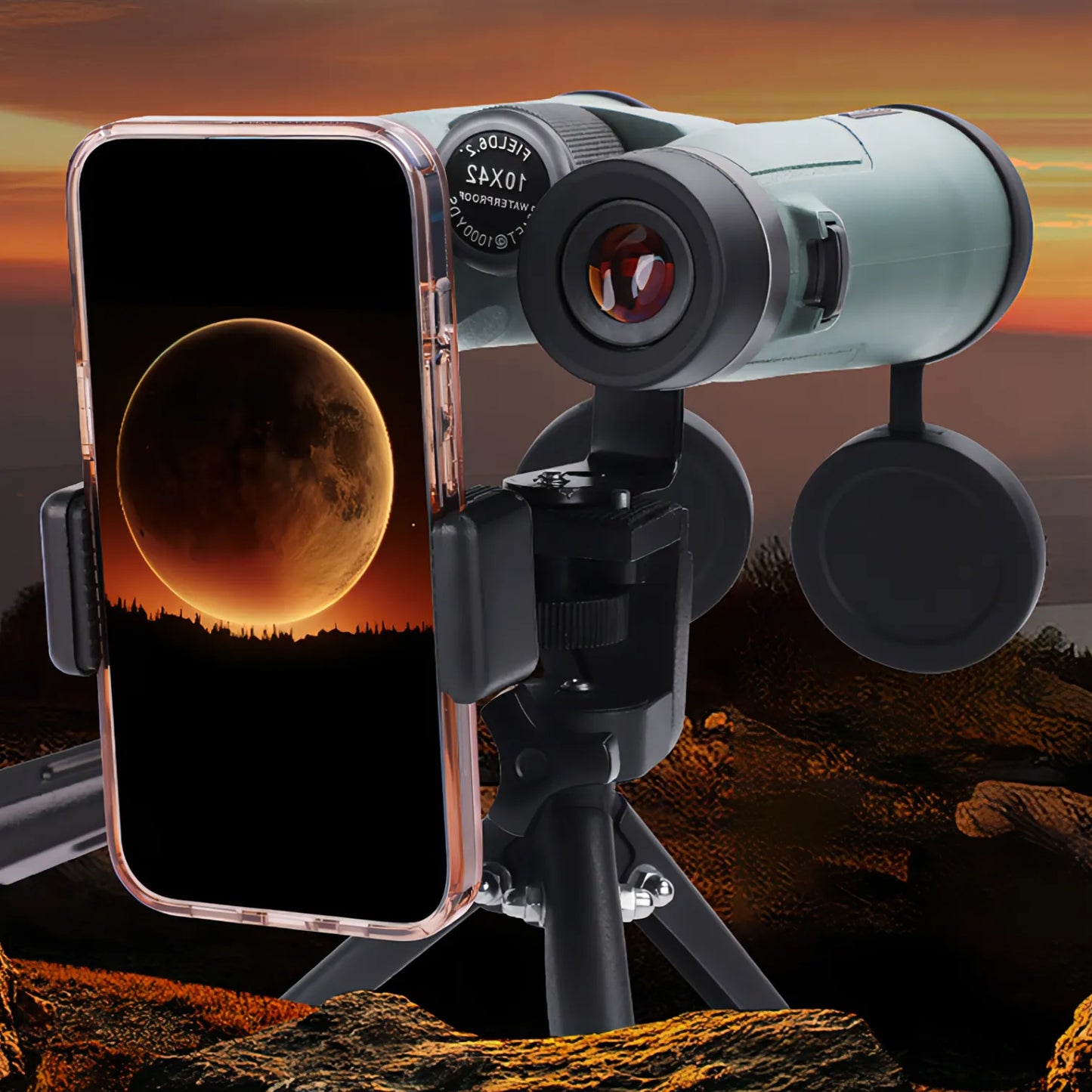 Bytech Binoculars with smartphone displaying moon image against a sunset landscape