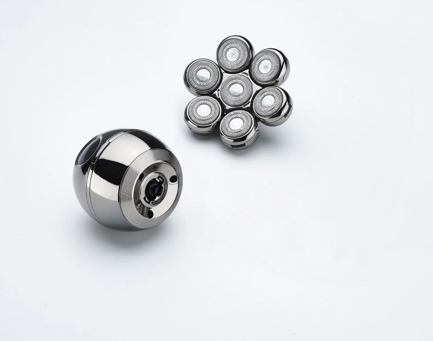 Calthic Head Shaver bearing and multiple smaller bearings on a white background