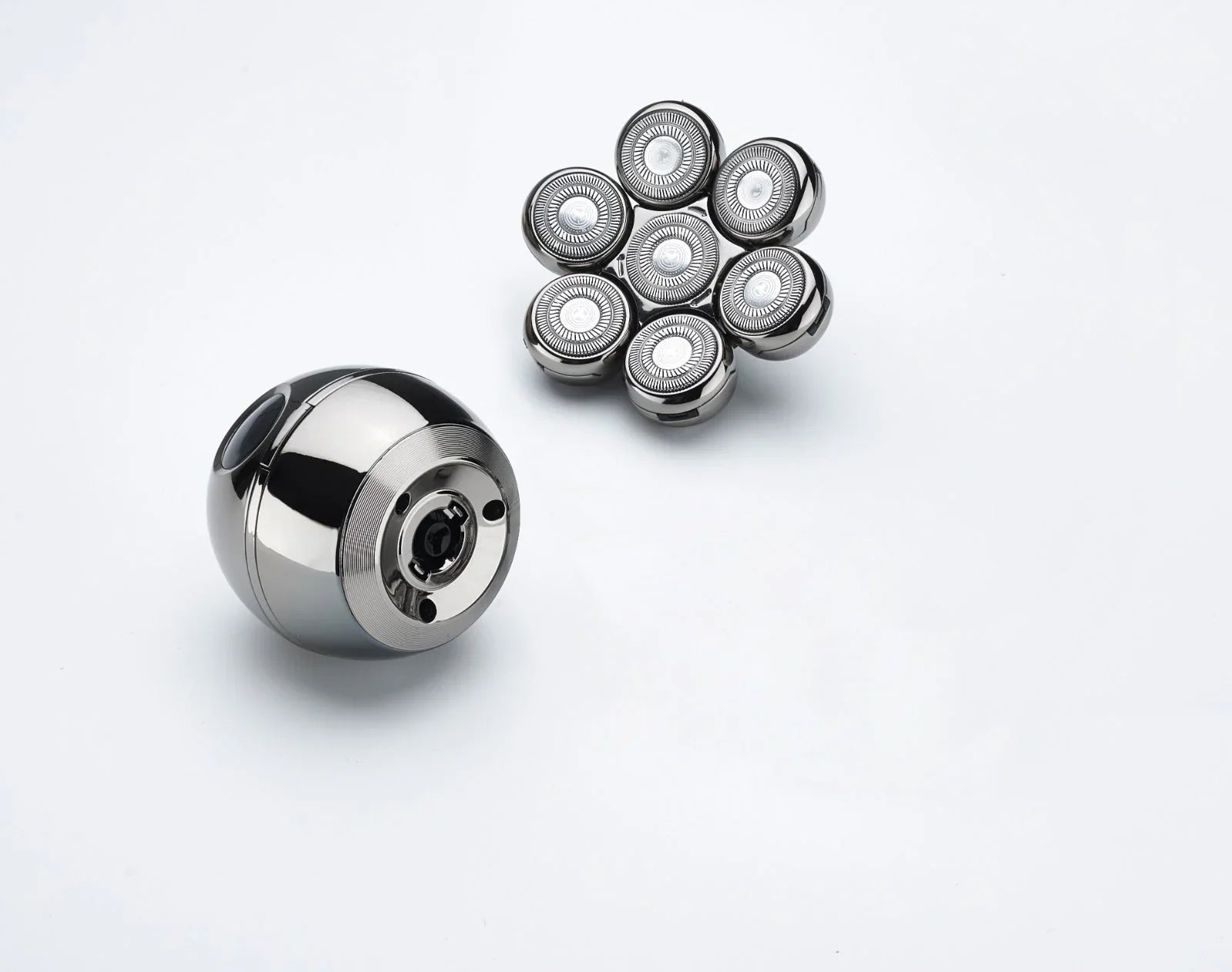 Calthic Head Shaver bearing and multiple smaller bearings on a white background