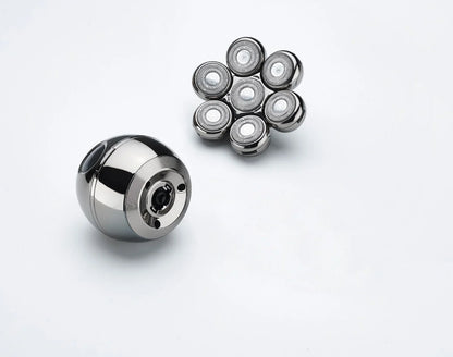Calthic Head Shaver bearing and multiple smaller bearings on a white background