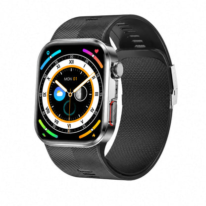 A Clorant Smart Blood Pressure Watch with a rectangular silver-toned metal case and a textured black silicone strap, shown on a plain white background. The watch face displays a digital watch interface with Roman numerals and colorful icons.