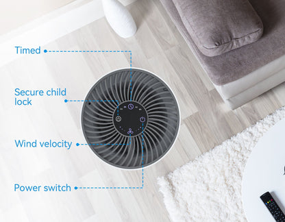 Klarity Air Purifier on a wooden floor with labeled features in a living room setting