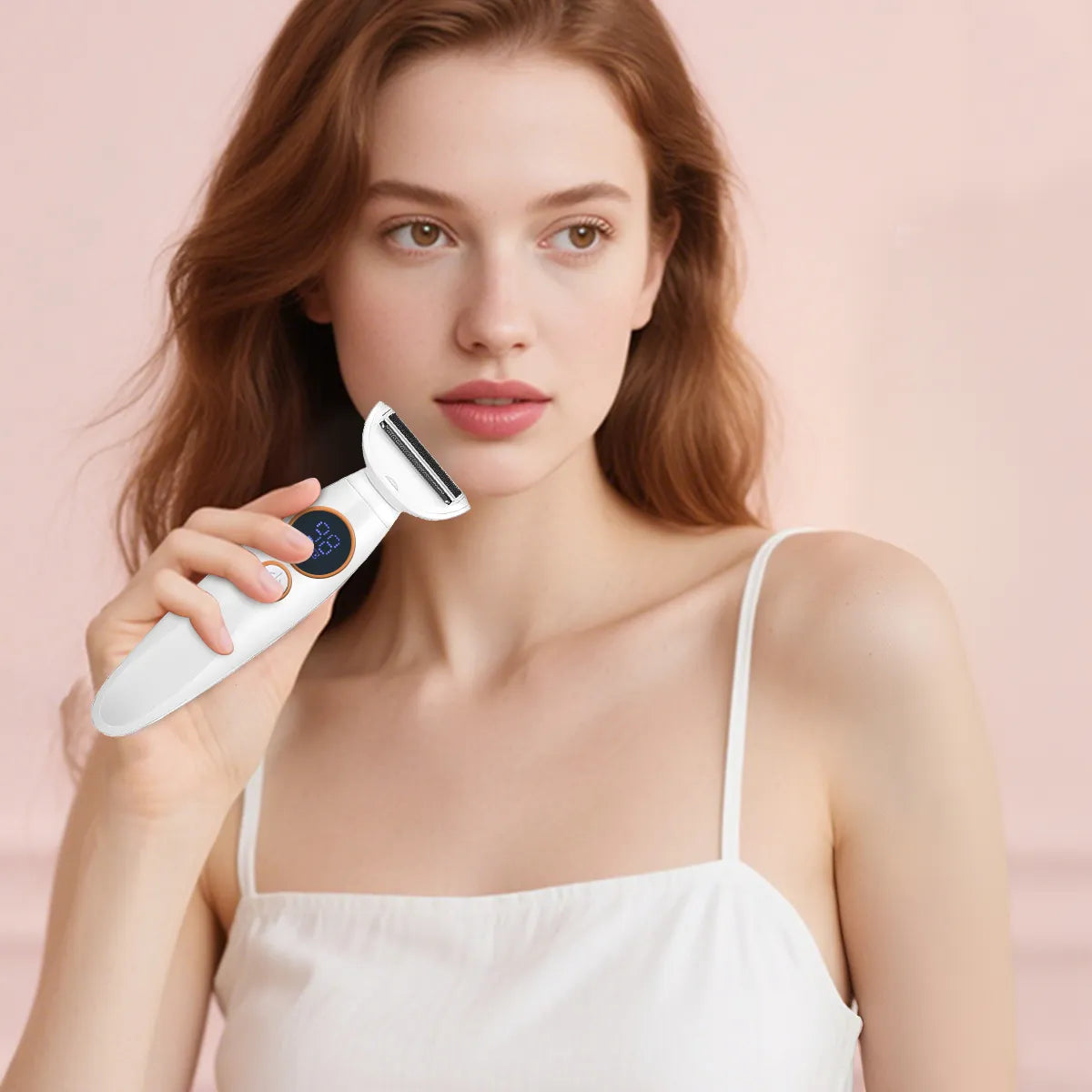 woman holding a white Sekoda Bikini Trimmer device against a pink background