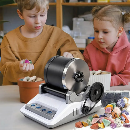 Two children interacting with a Stonnic Professional Stone Polishing Kit rock crusher and minerals on a table.