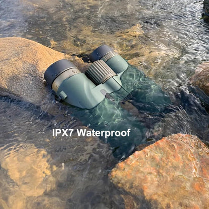 Valisus Binoculars partially submerged in water with 'IPX7 Waterproof' text displayed.