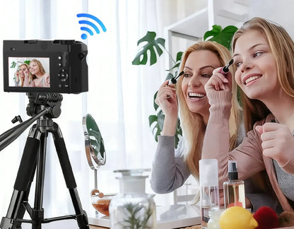 Two women applying makeup in front of a Vantiro Digital Camera on a tripod, with a Wi-Fi symbol indicating remote control.