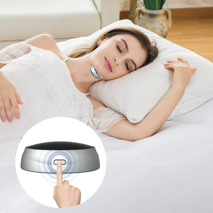 Woman lying on a bed with a white pillow, using a handheld mivrass Smart Anti Snoring Device.